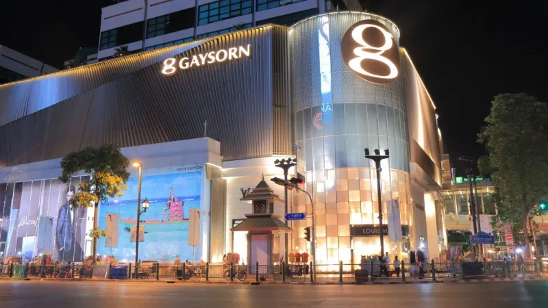 People walk passing through Louis Vuitton Shop at Gaysorn Plaza