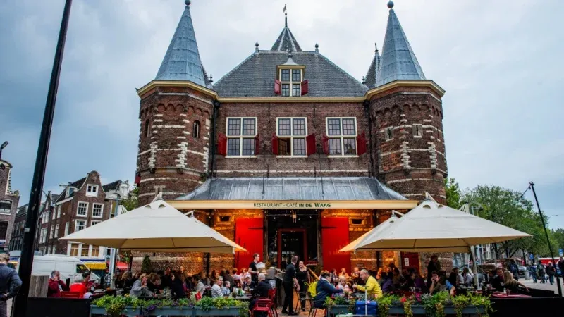 Dine at outdoor cafes in Amsterdam