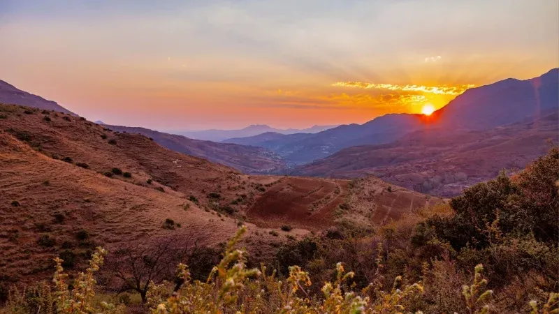 Experience Sunset Over the Valley