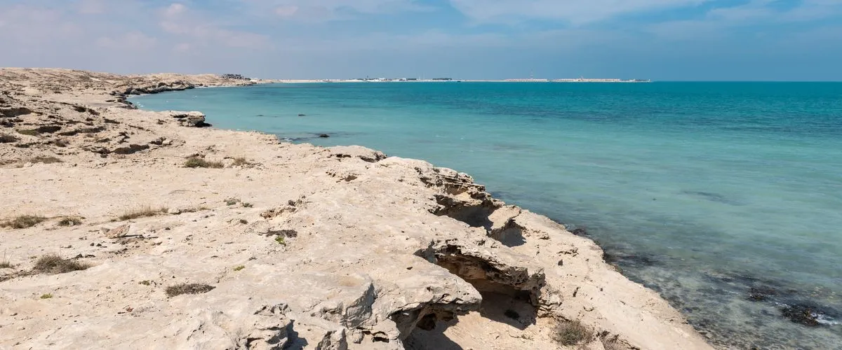 Fuwairit Beach Qatar: Let The Sea Meet The Crumbling Hills